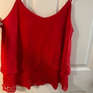 dressy tank with 2 layer/ruffled bottom small crisscross detail on back.